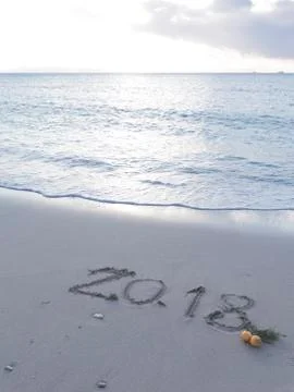 Figures 2018 on the beach, vertically Stock Photos