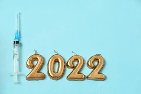 Figures 2022 on a blue background , the concept of Christmas and medicine Stock Photos
