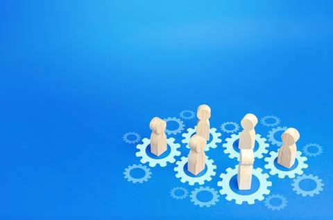 Figures of people interact with gears. Joining efforts and cooperation. Cor.. Stock Photos