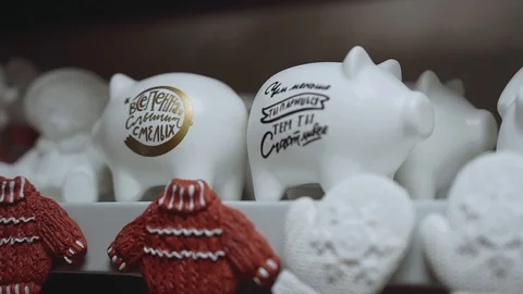 Figures of pigs from plaster are on the shelf Stock Footage 102258574