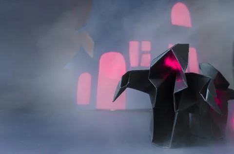 Figures of two dark ghosts with a red glow in the fog against. Stock Photos