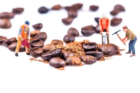 Figures working on coffee Stock Photos