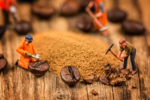 Figures working on coffee 写真素材