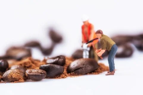 Figures working on coffee Foto stock