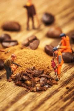Figures working on coffee Stock Photos