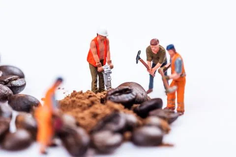 Figures working on coffee Stock Photos