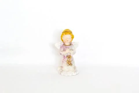 Figurine of angel on white background Stock Photos
