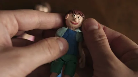 Figurine boy made from clay and paper Stock-Footage 144192524