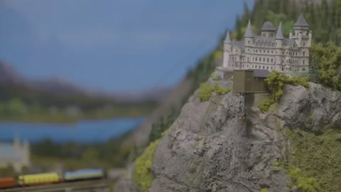 Figurine castle on hill-side with funicular Stock Footage 211878628