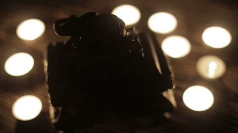 A figurine of an elephant by candlelight Stock Footage 63092626