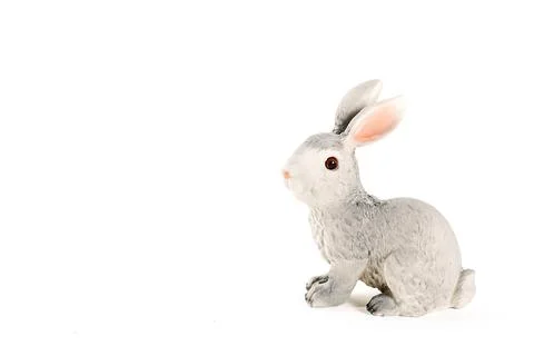 Figurine of a hare on a white background. Easter minimalistic concept Stock Photos