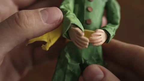 Figurine puppet boy made from clay and paper little prince Stock Footage 143431963