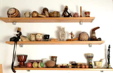 Figurine on the shelf Stock Photos
