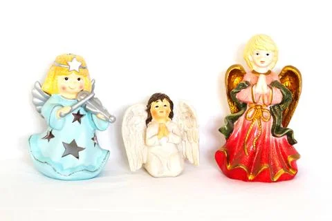 Figurines of angel on white background Stock Photos