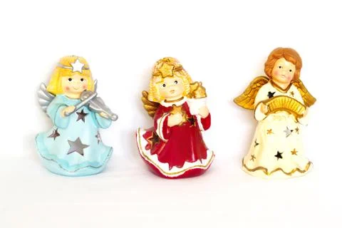 Figurines of angel on white background Stock Photos