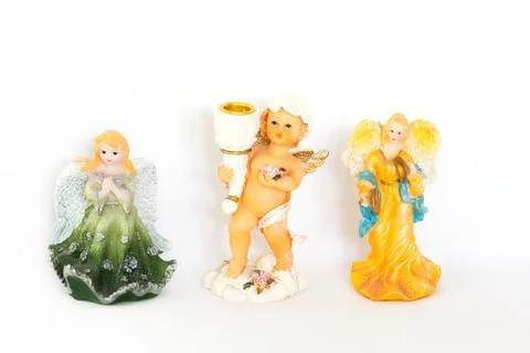 Figurines of angel on white background Stock Photos