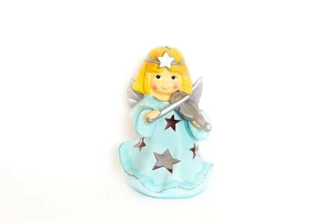 Figurines of angel on white background Stock Photos
