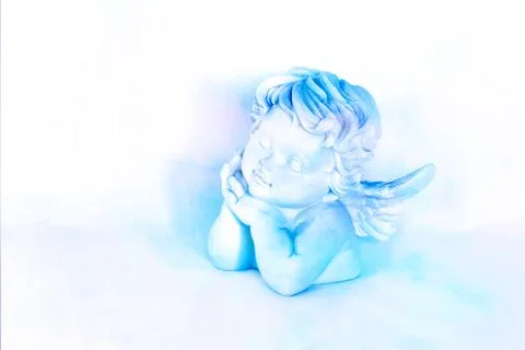 Figurines of angel on white background Stock Photos
