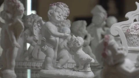 Figurines of angels Stock Footage 106572817