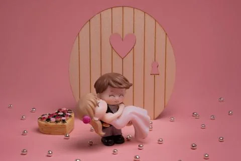 Figurines of a wedding cake Stock Illustration