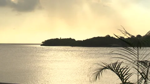 Fiji, Viti Levu, Distant Point and Sun Reflects on Water Stock Footage 46089978