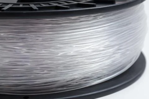 Filament for 3d printer crystal clear bright background Stock Photos