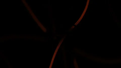 The filament in the light bulb flickers, goes out, and glows red due to a power Stock Footage 300891797