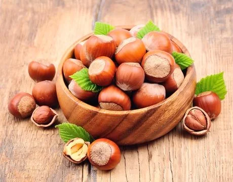 Filbert nuts with leaf Stock Photos