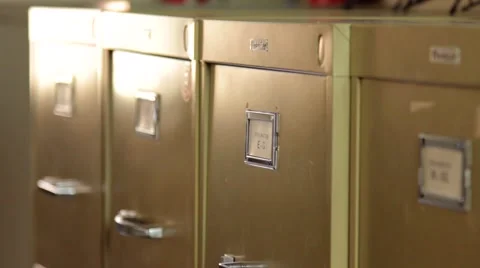 FILE BEING PULLED FROM FILI Stock Footage 1378125