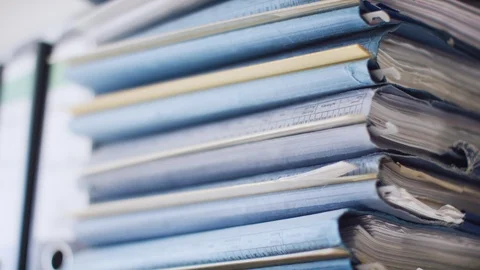 File on a big pile. A lot of work Video stock 118891463