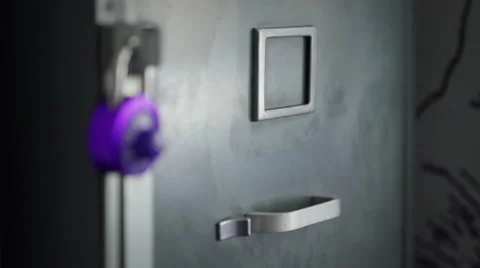 File Cabinet with Combination Lock - rack focus Stock Footage 54099822