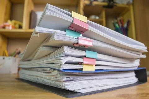 File folder and Stack of business report paper file on the table in a work 스톡 사진
