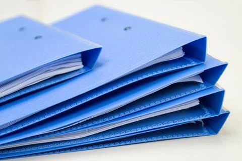 File folder and Stack of business report paper file on the table Stock Photos