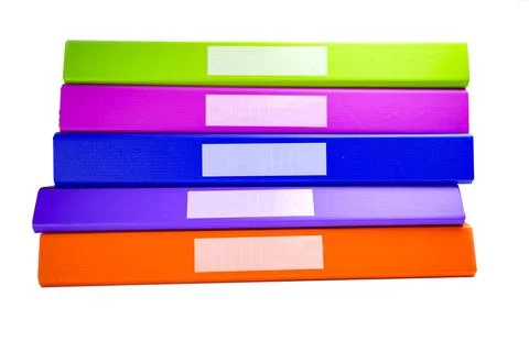 File Folder Binder stack of multi color on table in office. Stock Photos