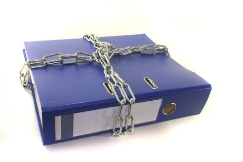 File folders closed with a chain in front of a white background Foto stock