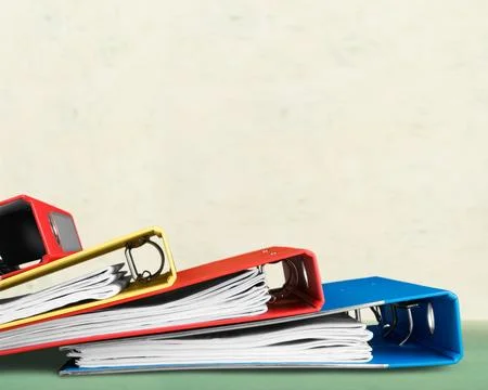 File folders with documents isolated on light background Stock Photos