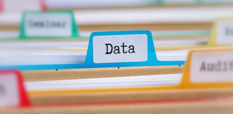 File folders with a tab labeled Data Stock Photos