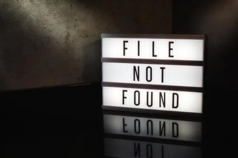File not found message on a light box with a dark cinematic feel Stock Photos