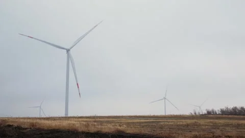 Filed with a wind generators in cloudy weather Stock Footage 147455380
