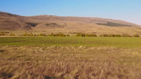 Filelds Hay Stacks Low Fly Through Stock-Footage 201481456