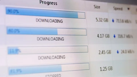 Files being downloaded on a torrent client Stock Footage 94158513
