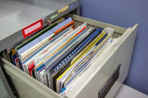 Files document of hanging file folders in a drawer in a whole pile Photos