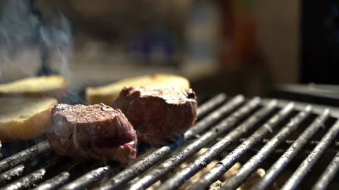 Filet mignon is fried on the grill close-up Stock Footage 168698762