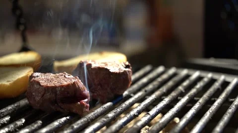 Filet mignon is fried on the grill close-up Stock Footage 169044334