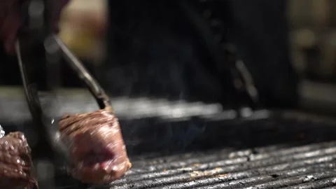 Filet mignon is fried on the grill close-up Stock Footage 169641630