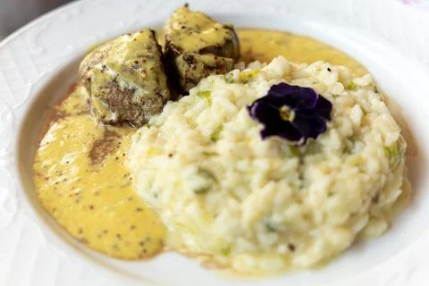 Filet mignon with risotto Stock Photos