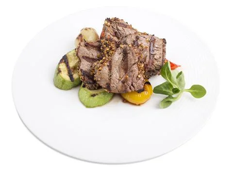 Filet mignon with vegetables. Stock Photos
