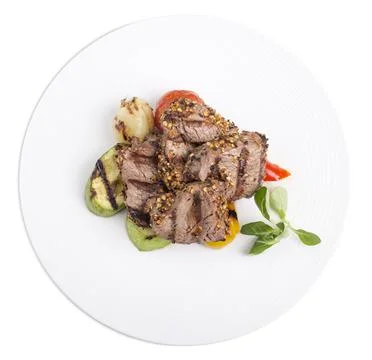 Filet mignon with vegetables. Stock Photos