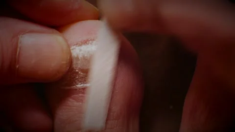 Filing down big toe nail with fungal infection Video stock 291072770