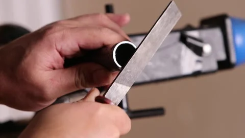 Filing file cut bicycle fork steerer tube with metal file after cutting Stock Footage 307452515